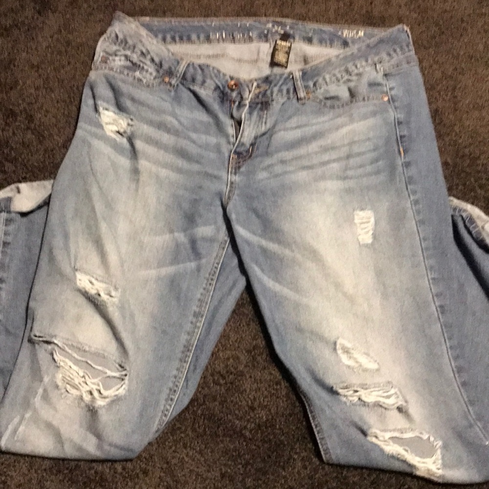 Dark colored ripped jeans